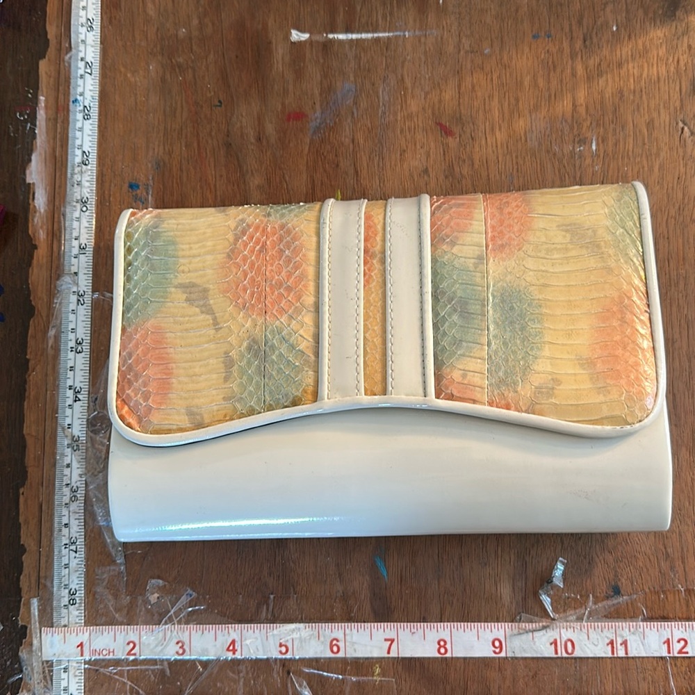 Pastel Floral-Embossed Cream Clutch